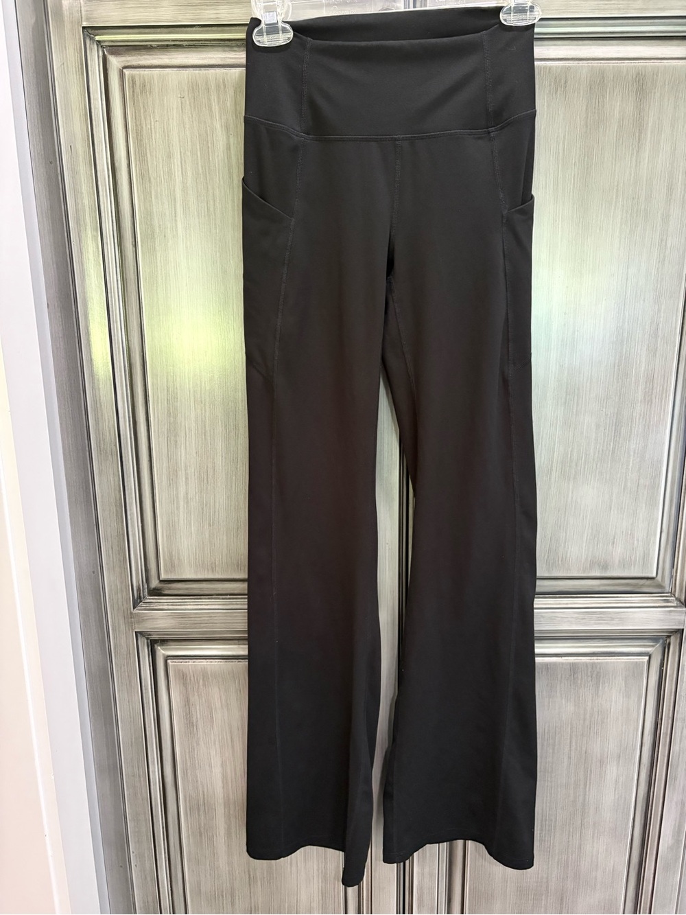 Fabletics Black High-Waist Flared Yoga Pants with Side Pockets